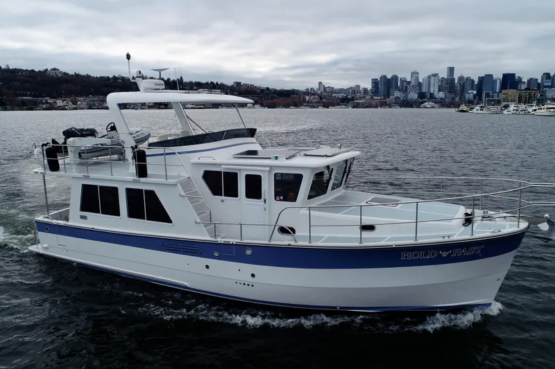 Slide: The Image of 2024 Helmsman Trawlers 43E Pilothouse cruising on Lake Union, Seattle. - 3