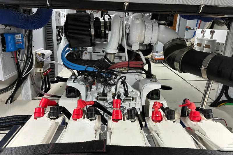 Slide: The Image of Engine room of 2024 Helmsman Trawlers 43E PILOTHOUSE battery rack. - 43