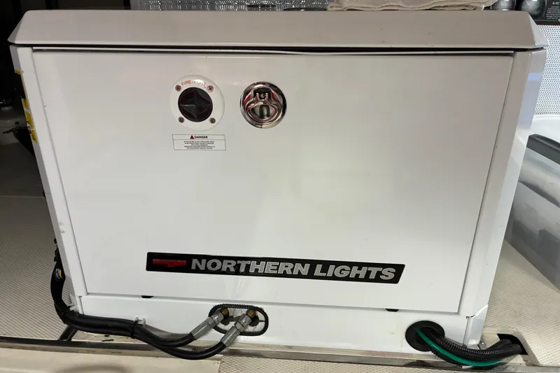 Slide: The Image of Northern Lights generator in 2024 Helmsman Trawlers 43E Pilothouse yacht. - 44