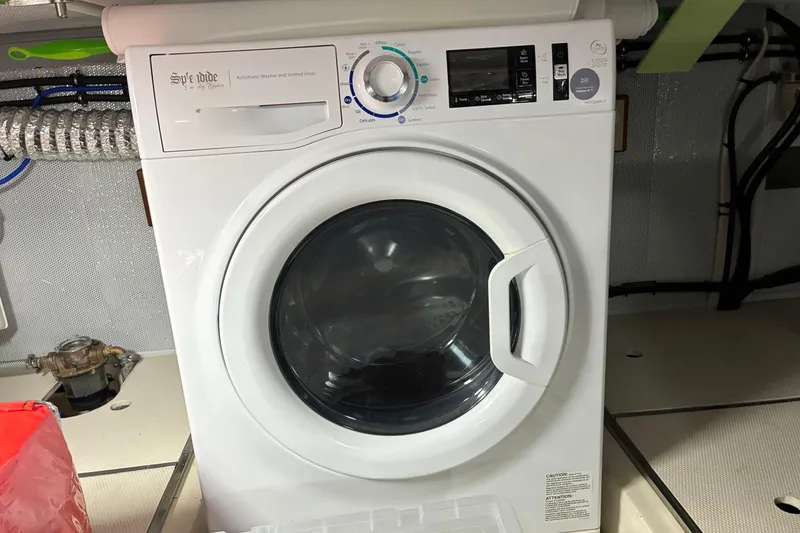 Slide: The Image of Spendide washer-dryer unit in 2024 Helmsman Trawlers 43E PILOTHOUSE boat interior. - 45