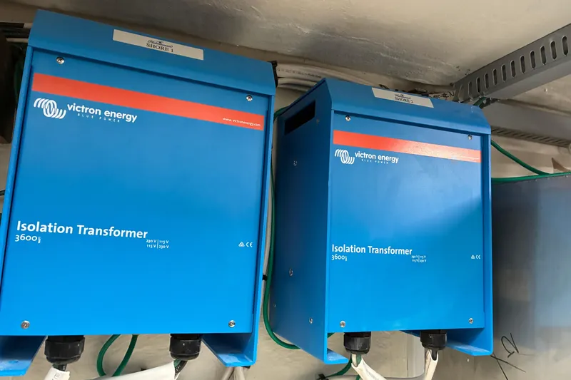 Slide: The Image of Victron Energy isolation transformers on 2024 Helmsman Trawlers 43E PILOTHOUSE boat. - 49