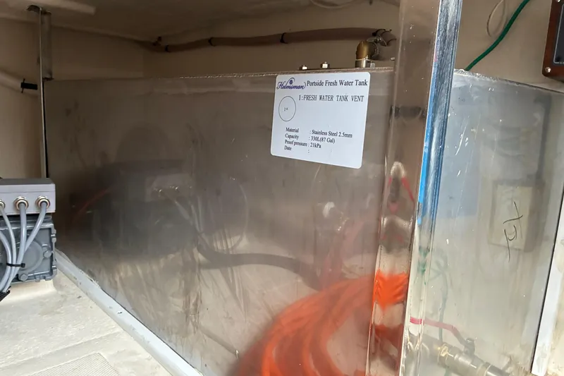 Slide: The Image of Stainless steel fresh water tank in 2024 Helmsman Trawlers 43E Pilothouse boat. - 51