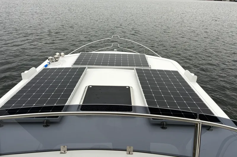 Slide: The Image of 2024 Helmsman Trawlers 43E PILOTHOUSE solar panels mounted on pilothouse roof. - 59