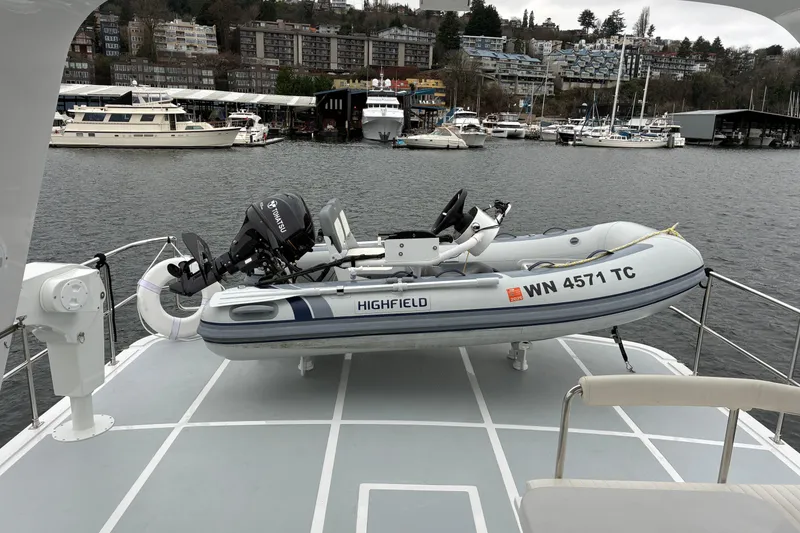 Slide: The Image of 2024 Helmsman Trawlers 43E PILOTHOUSE with Highfield tender on flybridge. - 69