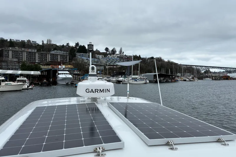 Slide: The Image of 2024 Helmsman Trawlers 43E Pilothouse solar panels mounted topside of hardtop. - 72