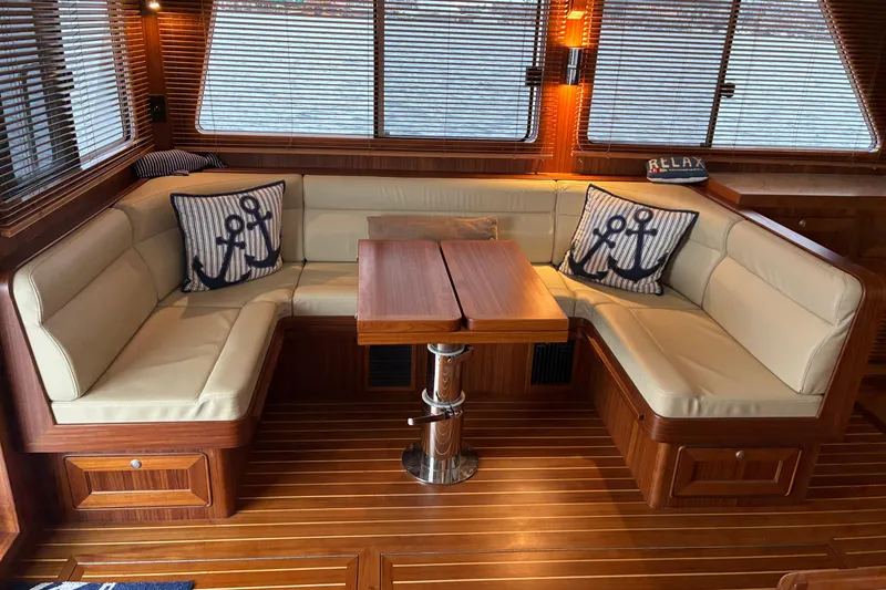 Slide: The Image of Luxurious interior of 2024 Helmsman Trawlers 43E Pilothouse with cozy salon settee. - 8
