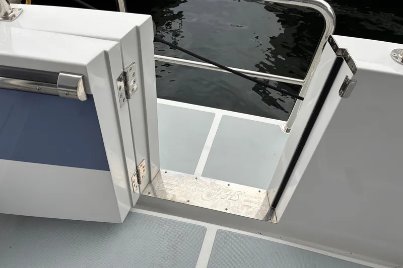 Slide: The Image of 2024 Helmsman Trawlers 43E PILOTHOUSE transom door. - 80