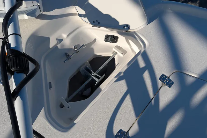 Slide: The Image of Anchor compartment of 2026 Key West 210 Bay Reef boat, open and empty. - 18