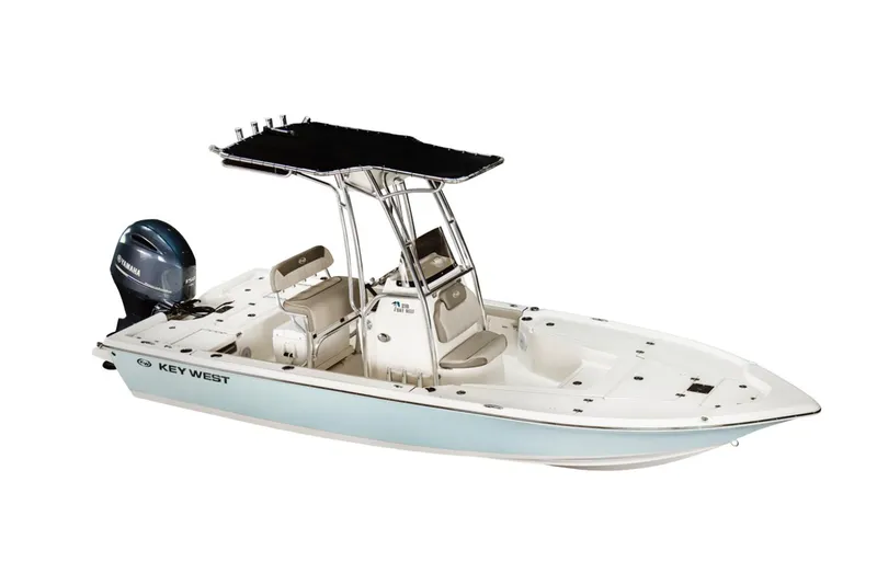 Slide: The Image of 2026 Key West 210 Bay Reef boat deck with storage compartments and rod holders. - 7
