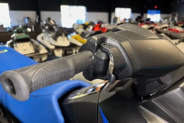 Slide: The Image of Close-up of 2023 Yamaha WaveRunner EX Limited handlebar in a showroom. - 13