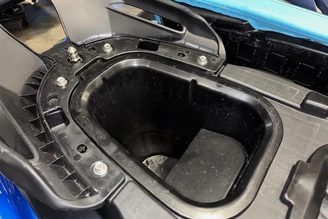 Slide: The Image of 2023 Yamaha WaveRunner EX Limited storage compartment, open and empty, showcasing interior design. - 22