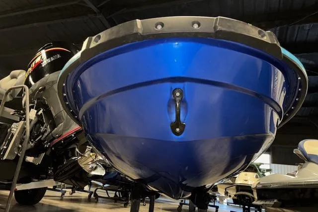 Slide: The Image of 2023 Yamaha WaveRunner EX Limited, blue hull, displayed indoors. - 23