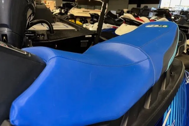 Slide: The Image of 2023 Yamaha WaveRunner EX Limited with blue seat in showroom. - 25