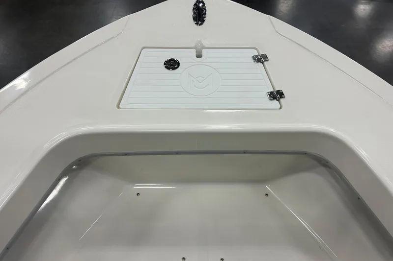 Slide: The Image of 2026 Maycraft 238CC boat interior, featuring a storage compartment with a secure latch. - 19