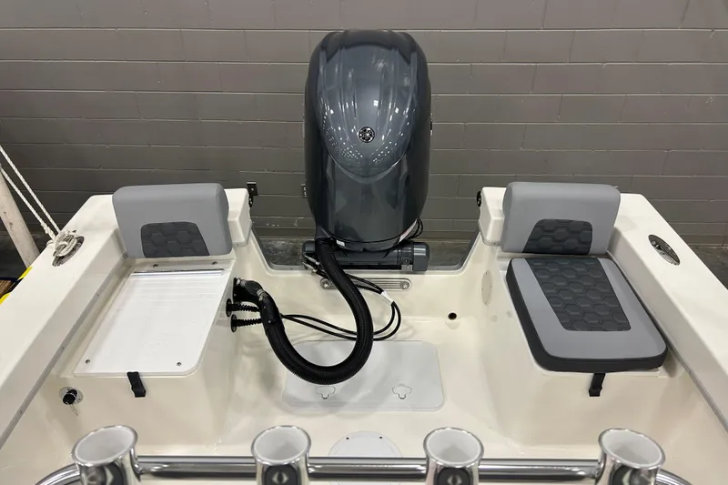 Slide: The Image of 2026 Maycraft 238CC boat interior with engine and seating, showcasing modern design. - 21