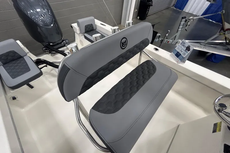 Slide: The Image of 2026 Maycraft 238CC boat interior with cushioned seating and modern design. - 23
