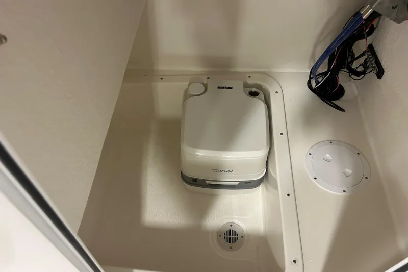 Slide: The Image of Portable toilet in 2026 Maycraft 238CC boat interior. - 24