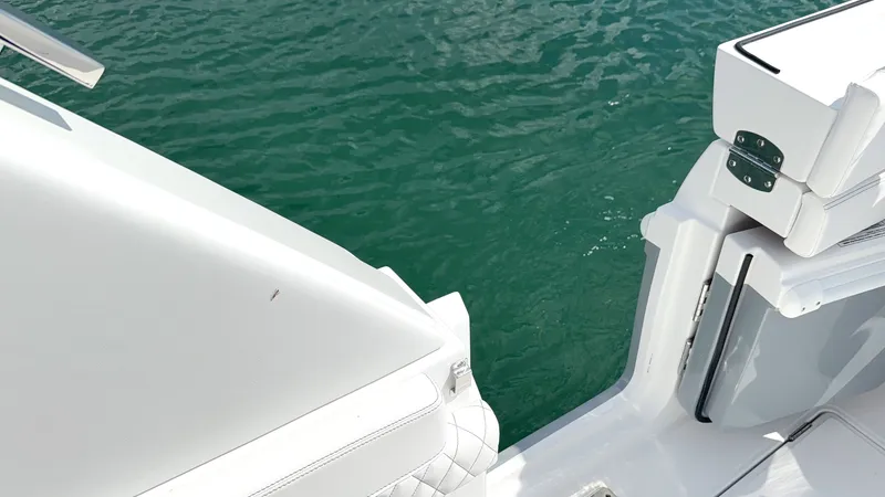 Slide: The Image of Intrepid 35 VALOR 2026: Sleek design with white upholstery and clean lines on the water. - 13