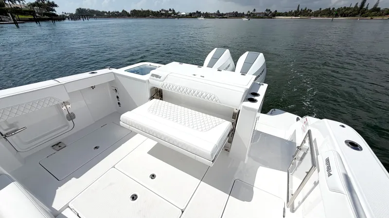 Slide: The Image of Intrepid 35 VALOR 2026: Spacious cockpit with white upholstery, on calm water. - 14
