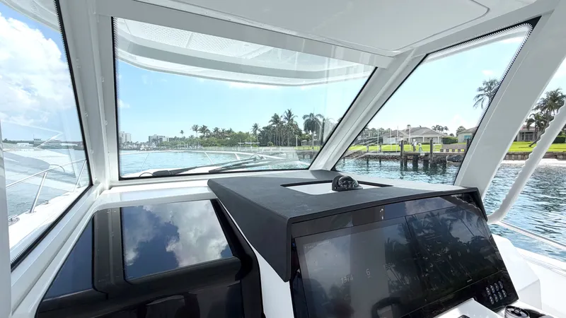 Slide: The Image of View from the cockpit of an Intrepid 35 VALOR overlooking the water and shoreline. - 21