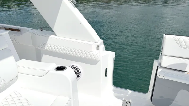 Slide: The Image of Intrepid 35 VALOR 2026 with sleek white seating and modern design on calm water. - 28