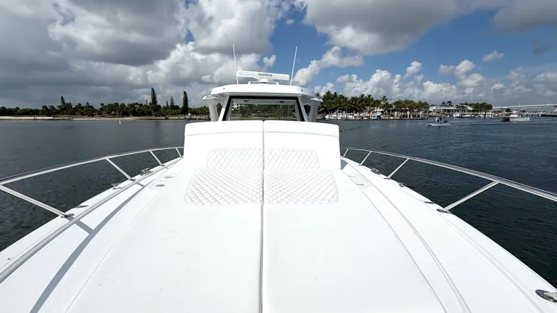 Slide: The Image of Intrepid 35 VALOR 2026 on calm water with a cloudy sky. - 33