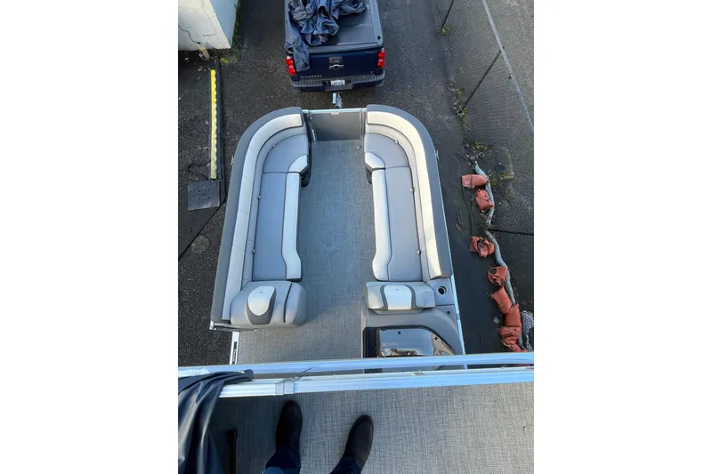 Slide: The Image of 2025 Tahoe Pontoon Cascade Cruise Funship with spacious seating, viewed from above. - 15