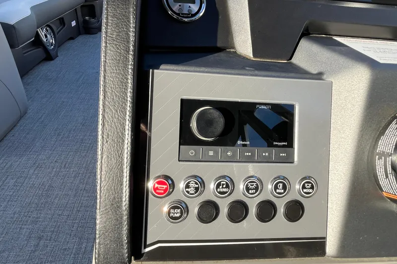 Slide: The Image of Control panel of 2025 Tahoe Pontoon Cascade Cruise Funship with audio and function buttons. - 18