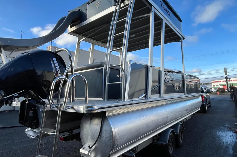 Slide: The Image of 2025 Tahoe Pontoon Cascade Cruise Funship with slide and ladder, parked outdoors. - 4