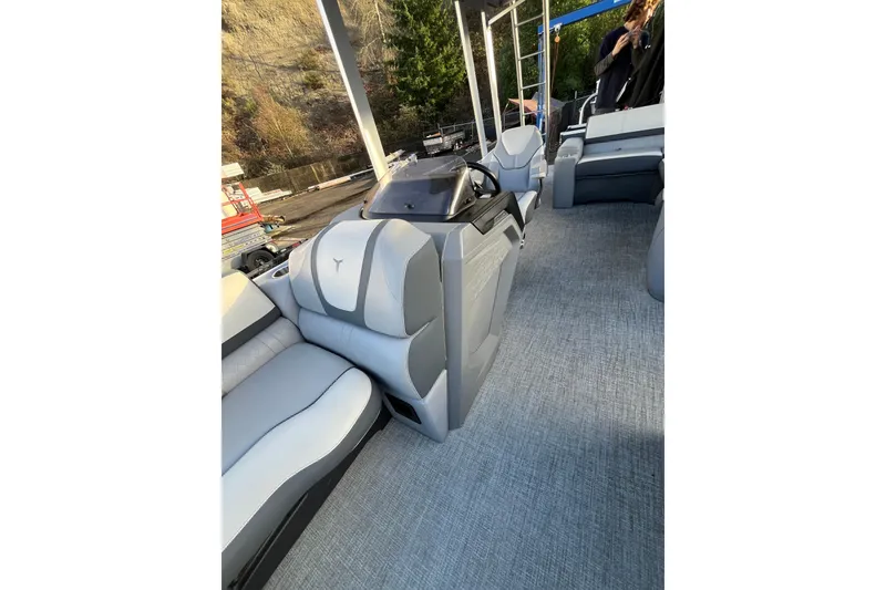 Slide: The Image of 2025 Tahoe Pontoon Cascade Cruise Funship interior with plush seating and modern design. - 5