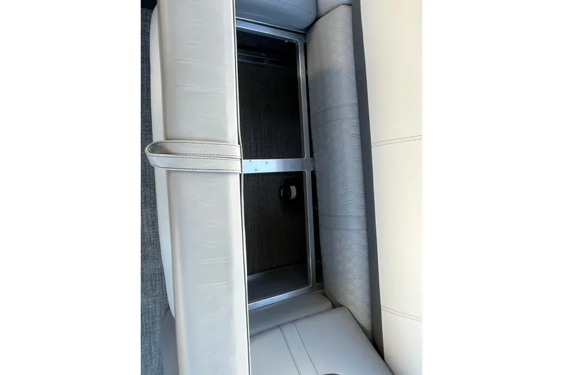 Slide: The Image of 2025 Tahoe Pontoon Cascade Cruise Funship interior seating storage compartment. - 8
