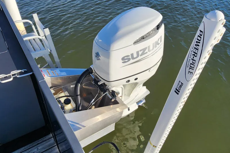 Slide: The Image of 2023 Veranda Fish VF25F2plus2 boat with Suzuki outboard motor and Power-Pole anchor. - 5
