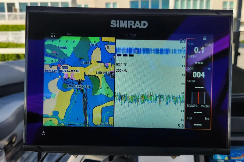 Slide: The Image of Simrad marine GPS display on 2023 Veranda Fish VF25F2plus2 boat, showing navigation and sonar data. - 8