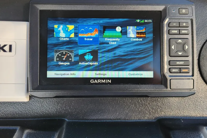 Slide: The Image of Garmin display on 2023 Veranda Fish VF25F2plus2 boat dashboard, showing navigation and sonar options. - 9