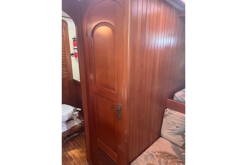 Slide: The Image of Control panel of a 1986 Liberty 49 boat with digital displays and compass. - 24