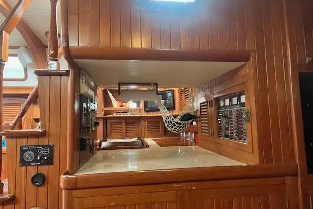 Slide: The Image of 1986 Liberty 49 yacht bathroom with wooden accents and nautical-themed decor. - 38