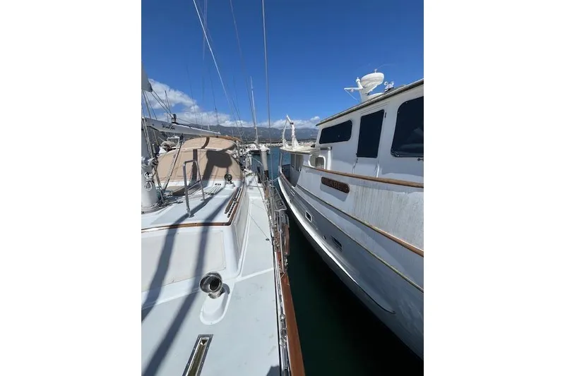Slide: The Image of Interior of 1986 Liberty 49 yacht with kitchen, hammock, and control panel. - 43