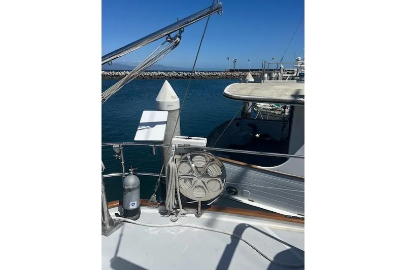 Slide: The Image of Interior of 1986 Liberty 49 yacht with wooden paneling and navigation equipment. - 44
