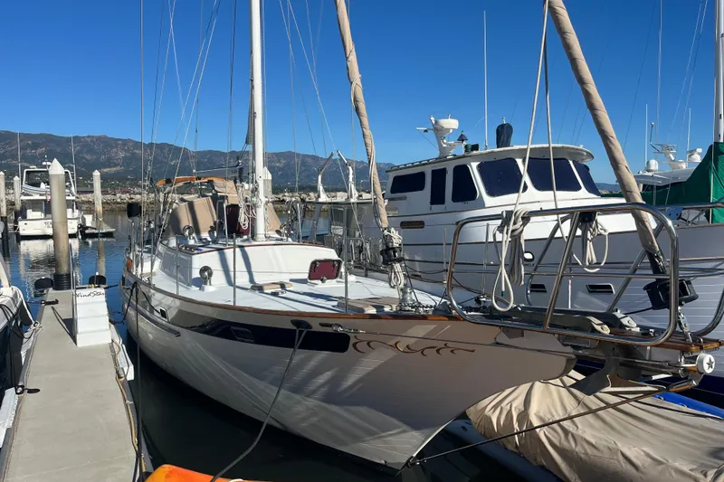 Slide: The Image of Kohler generator in a 1986 Liberty 49 yacht engine room, surrounded by wiring. - 52