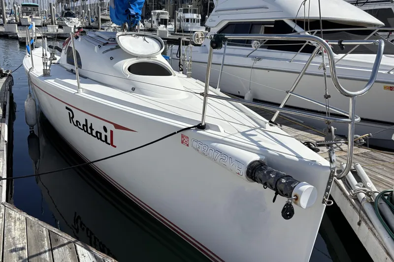The Image of Sailboat "Redtail" docked, Flying Tiger FT-10M, 2007 model, in a marina setting. - 0