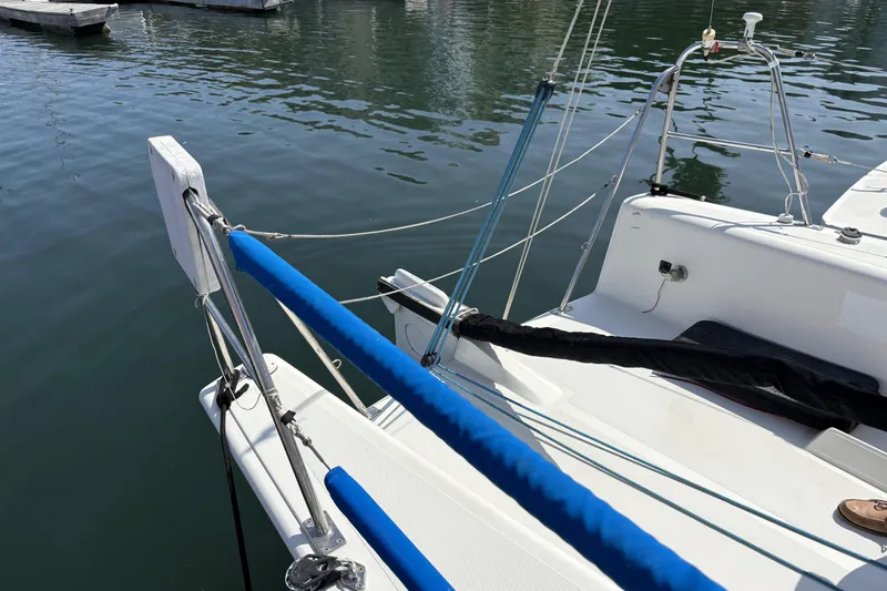 Slide: The Image of Sailboat docked at marina, Flying Tiger FT-10M, 2007 model, with blue rail covers. - 12