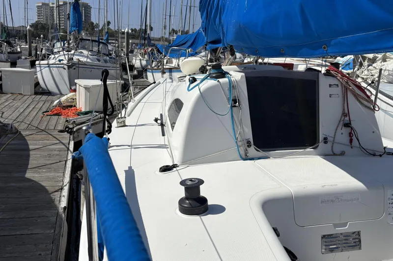 Slide: The Image of Sailboat docked at marina, Flying Tiger FT-10M, 2007 model, with blue sail covers. - 19
