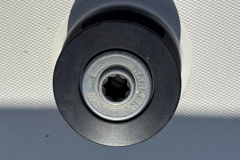 Slide: The Image of Close-up of a Flying Tiger FT-10M winch handle, 2007 model, on textured surface. - 20