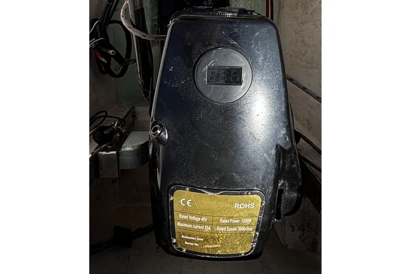 Slide: The Image of Black Flying Tiger FT-10M motor, 2007 model, with specifications label. - 23