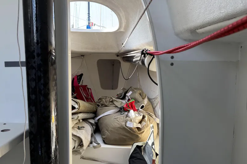 Slide: The Image of Interior of 2007 Flying Tiger FT-10M sailboat with stored sails and equipment. - 30