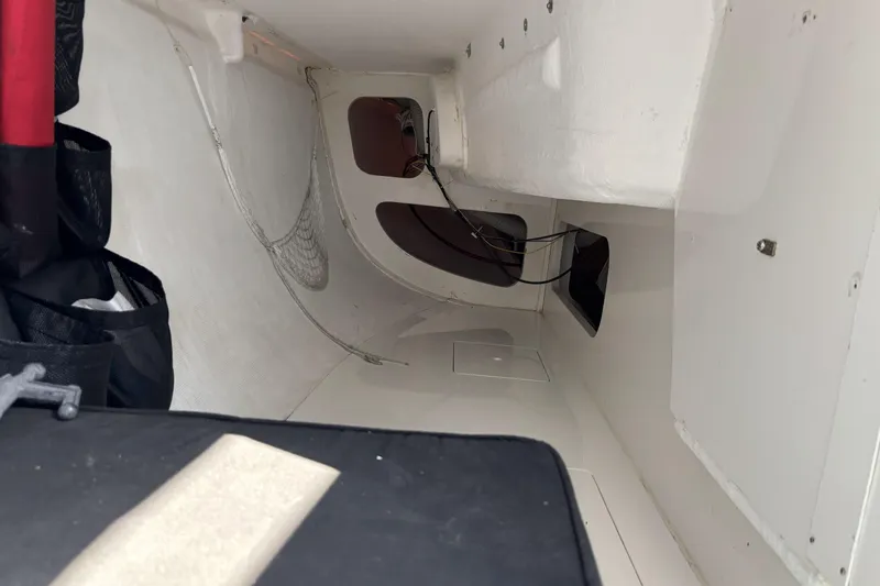 Slide: The Image of Interior of a 2007 Flying Tiger FT-10M sailboat, featuring storage and netting. - 35
