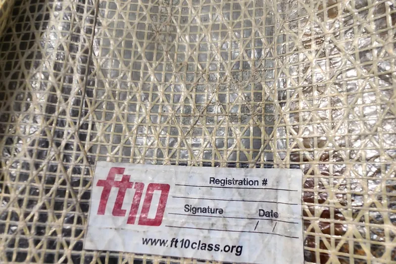 Slide: The Image of Woven material with FT-10 label from Flying Tiger FT-10M, 2007 model. - 39