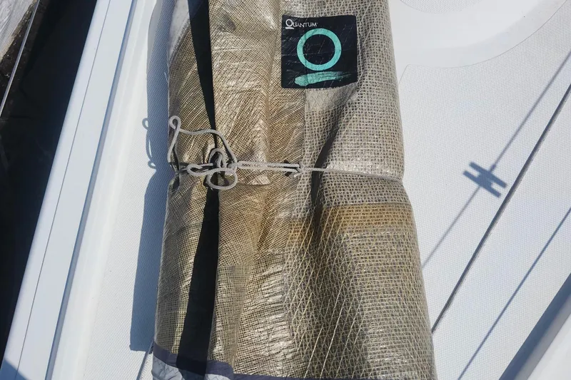 Slide: The Image of Rolled sail on Flying Tiger FT-10M, 2007 model, featuring Quantum logo. - 40