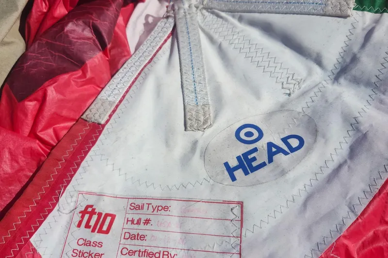 Slide: The Image of Close-up of a Flying Tiger FT-10M sail with "HEAD" logo, 2007 model. - 44