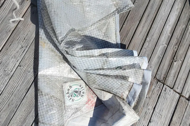 Slide: The Image of Folded sail on wooden deck, Flying Tiger FT-10M, 2007 model. - 46